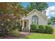 Charming single-story home featuring a landscaped front yard and large front window for natural light at 1102 Laurens Way, Knightdale, NC 27545