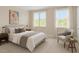 Staged bedroom featuring carpet, window and neutral wall color at 111 Finsbury Street St, Durham, NC 27703