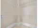 Spacious walk-in closet with installed shelving providing ample storage space at 111 Finsbury Street St, Durham, NC 27703