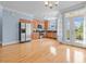 Modern kitchen with stainless steel appliances, wood cabinetry, and natural light at 111 Finsbury Street St, Durham, NC 27703