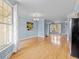 Bright, open-concept living and dining area with hardwood floors and natural light at 111 Finsbury Street St, Durham, NC 27703