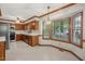 Functional kitchen with wood cabinets, updated appliances, and a cozy breakfast nook at 1113 Smokewood Dr, Apex, NC 27502
