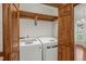 Convenient laundry closet featuring a modern washer and dryer setup at 1113 Smokewood Dr, Apex, NC 27502