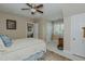 Bedroom featuring ceiling fan, neutral walls, and plush carpeting at 114 Fieldstone Dr, Burlington, NC 27215