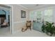 Bright sitting area with natural light, cozy chair, and stylish decor at 114 Fieldstone Dr, Burlington, NC 27215