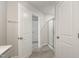 Bright bathroom featuring neutral colors, gray tile floors, and a walk-in shower with a glass enclosure at 1230 Adrian Ct, Mebane, NC 27302