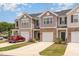 Attractive townhouse complex with multiple units, well-kept lawns, and a modern architectural design at 1230 Adrian Ct, Mebane, NC 27302