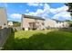 Spacious backyard with a patio, pergola, and fire pit, perfect for outdoor gatherings and entertaining at 12417 Kendall Ridge Ct, Durham, NC 27703