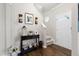Welcoming entryway boasting hardwood floors, staircase, and decorative accents with natural lighting at 12417 Kendall Ridge Ct, Durham, NC 27703