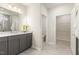 Bright bathroom with granite counters, double sinks, and a separate shower at 1304 Essex Skipper Way, Fuquay Varina, NC 27526