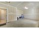 Unfinished two-car garage with concrete floor, drywall walls and ceiling ready for customization at 1304 Essex Skipper Way, Fuquay Varina, NC 27526