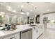Open-concept kitchen with a center island and stainless steel appliances at 1304 Essex Skipper Way, Fuquay Varina, NC 27526