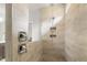 Tiled shower with shower head, seating, and glass partition at 1304 Essex Skipper Way, Fuquay Varina, NC 27526