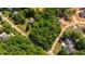 Aerial view of the home surrounded by a lush green neighborhood at 1329 Wynncrest Ct, Raleigh, NC 27603