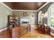 Office with hardwood floors, fireplace, and white trim at 1329 Wynncrest Ct, Raleigh, NC 27603