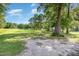 Expansive backyard with mature trees at 155 G Herring Rd, Princeton, NC 27569