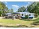 Charming single-story home with blue metal roof and covered front porch at 155 G Herring Rd, Princeton, NC 27569