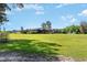Wide shot of outbuilding on a large lot showing its functional design and ample storage capacity at 155 G Herring Rd, Princeton, NC 27569