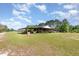 Large, covered outbuilding with a metal roof, perfect for storage or equipment at 155 G Herring Rd, Princeton, NC 27569