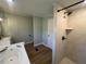 Modern bathroom with separate soaking tub and tiled walk-in shower at 165 Dawn Rd, Benson, NC 27504