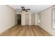 Spacious bedroom offering wood-look floors, ample natural light, and neutral walls at 165 Dawn Rd, Benson, NC 27504