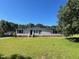 Charming single-story home with spacious yard and a covered front porch at 165 Dawn Rd, Benson, NC 27504