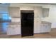 Updated kitchen features granite counters, new appliances, and ample storage space at 165 Dawn Rd, Benson, NC 27504