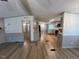 Spacious living room boasting an open floor plan and new, wood-look flooring at 165 Dawn Rd, Benson, NC 27504