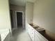 Bathroom featuring vanity with drawers and a doorway to a separate water closet at 168 Clayton Rd, Princeton, NC 27569