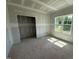Small bedroom featuring a large window and drywall installed, under construction at 168 Clayton Rd, Princeton, NC 27569