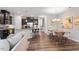 Open-concept space with kitchen, dining area, and living room, perfect for entertaining at 174 Walking Path Pl, Hillsborough, NC 27278