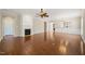 Spacious living area includes hardwood floors, fireplace, ceiling fan, and open layout at 204 Dowington Ln, Cary, NC 27519