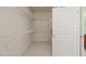 Spacious walk-in closet with white wire shelving at 204 Dowington Ln, Cary, NC 27519