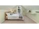 Cozy bedroom features a comfortable bed, pitched ceiling, and ample natural light at 209 Woodstar Dr, Cary, NC 27513
