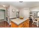 Spacious kitchen with a central island and seamless flow to other living spaces at 209 Woodstar Dr, Cary, NC 27513