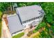 Lovely two-story home featuring a charming front porch and lush, mature landscaping in a desirable neighborhood at 2107 Somers Ave, Burlington, NC 27215