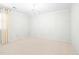 White bedroom, complete with a chandelier and neutral carpeting at 2107 Somers Ave, Burlington, NC 27215