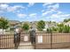 Community dog park surrounded by green space and modern homes, providing a dedicated area for pets at 217 Jones Hill Rd, Holly Springs, NC 27540