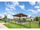 Community gazebo offers a shaded seating area in a park-like setting with a playground nearby at 217 Jones Hill Rd, Holly Springs, NC 27540