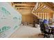 Unfinished basement with exposed beams, and ready for custom build-out at 225 Alcock Ln, Youngsville, NC 27596