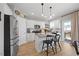 Bright and modern kitchen with granite countertops and stainless steel appliances at 225 Alcock Ln, Youngsville, NC 27596