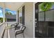 Cozy front porch featuring comfortable seating and a welcoming entrance at 225 Alcock Ln, Youngsville, NC 27596