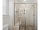 Modern bathroom with a glass enclosed shower, a built-in bench, and beautiful tile work at 225 Alcock Ln, Youngsville, NC 27596