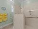 Updated bathroom featuring an extra large shower, towel rack, and neutral paint at 232 Shady Hollow Ln, Garner, NC 27529