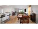 Bright dining room area with hardwood floors and view of living area at 2406 Lily Dr, Haw River, NC 27258