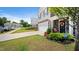The property is a charming two-story home with a driveway, garage, and front entrance at 2406 Lily Dr, Haw River, NC 27258