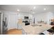 Bright kitchen with granite countertops, stainless appliances, and a convenient island with a sink at 2406 Lily Dr, Haw River, NC 27258