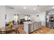 The Kitchen features modern appliances, an island, and an open concept living space at 2406 Lily Dr, Haw River, NC 27258