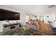 The Living room features an open layout, television, and view of the kitchen at 2406 Lily Dr, Haw River, NC 27258