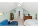Cozy bedroom featuring sloped ceilings, a ceiling fan, and charming decor accents at 2408 Fordcrest Dr, Apex, NC 27502